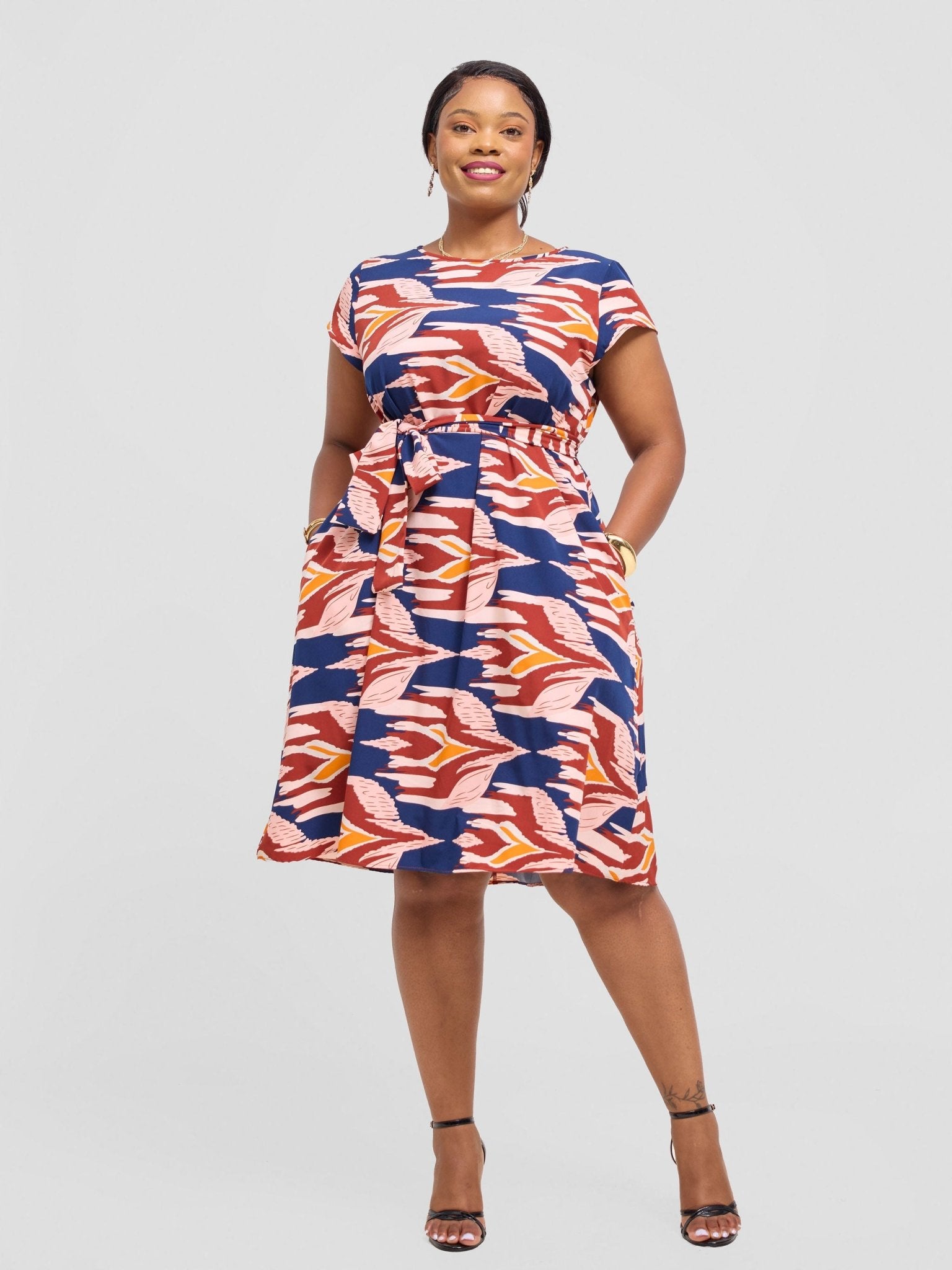 Vivo Zuri Sleeveless Tent High Low Top - Green / Orange Print