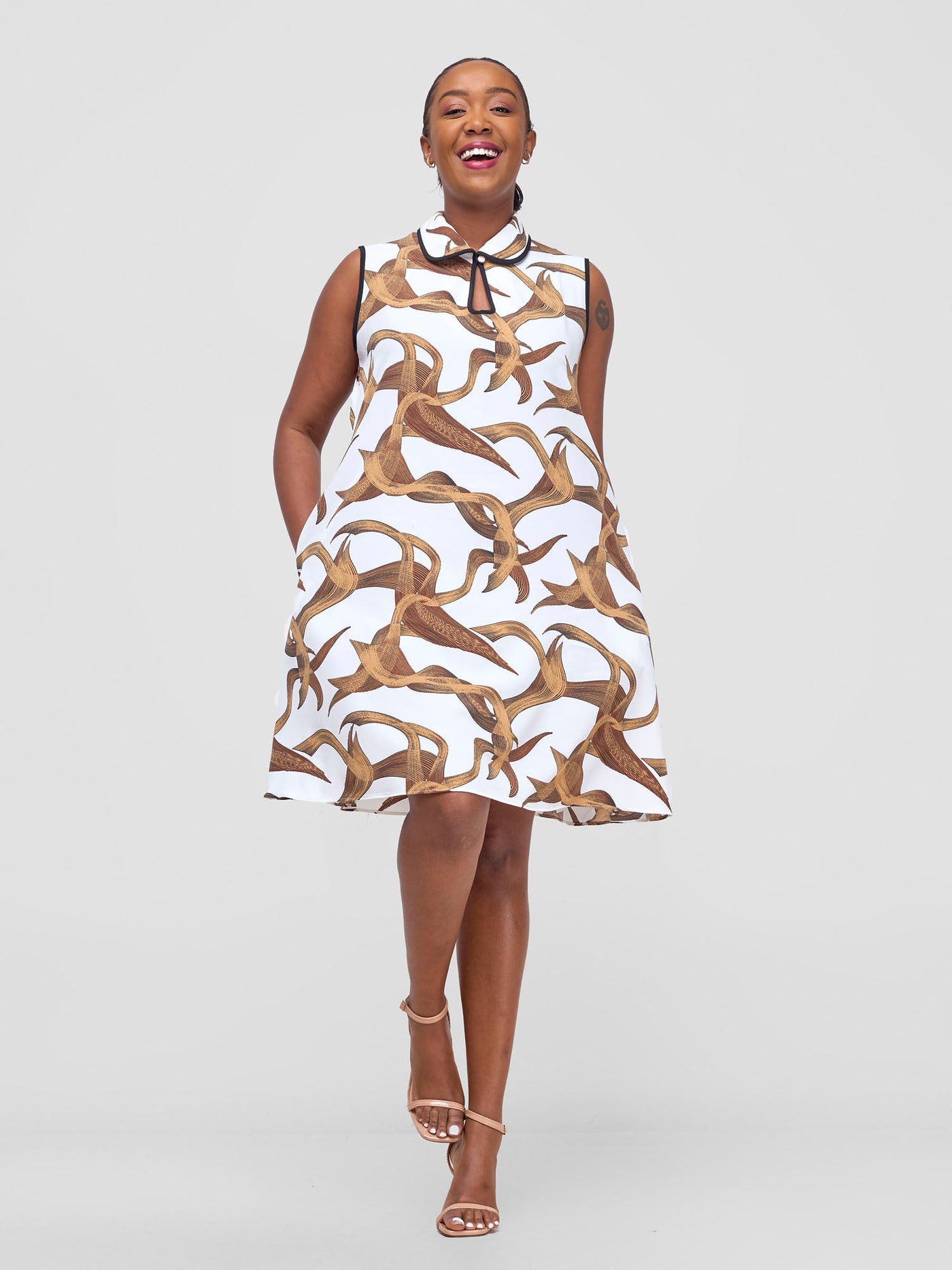 Vivo Asha Sleeveless Knee Length Dress - White / Brown Print - Shopzetu